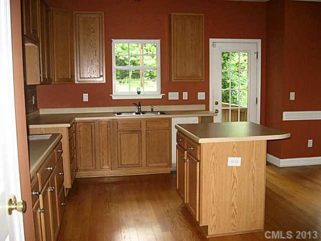 5727 Charing Place Charlotte, NC 28211 - Photo 6 of 15 a kitchen with stainless steel appliances granite countertop a sink stove and refrigerator