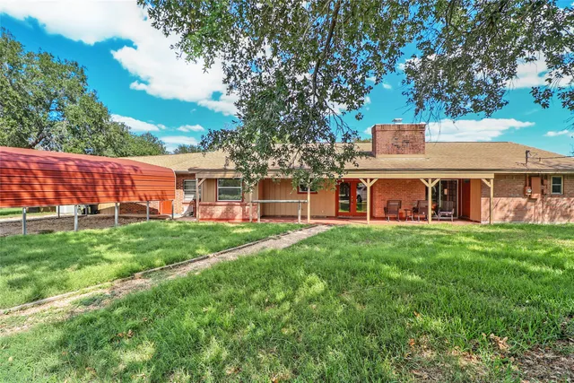 a view of a chairs with sitting area