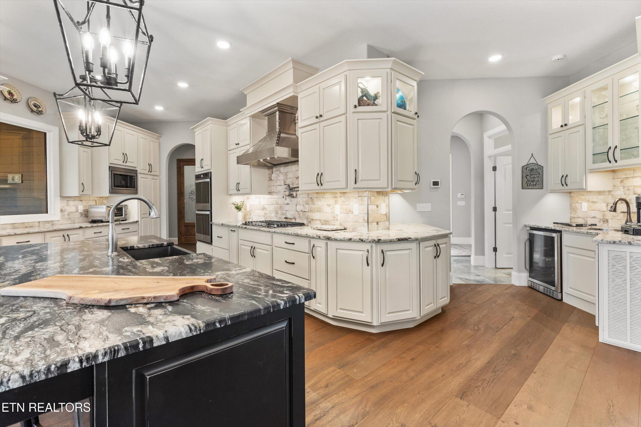 1752 Hillendale Road Crossville, TN 38572 - Photo 18 of 60 a kitchen with a sink stainless steel appliances a counter space and a window