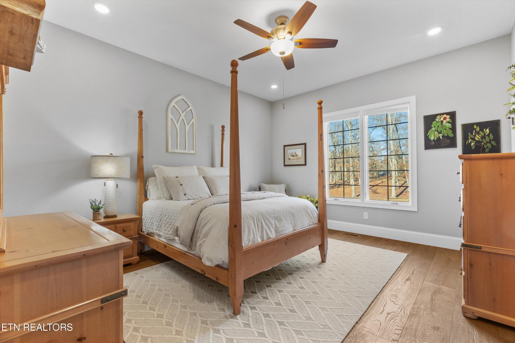 1752 Hillendale Road Crossville, TN 38572 - Photo 26 of 60 a spacious bedroom with a bed and a large window
