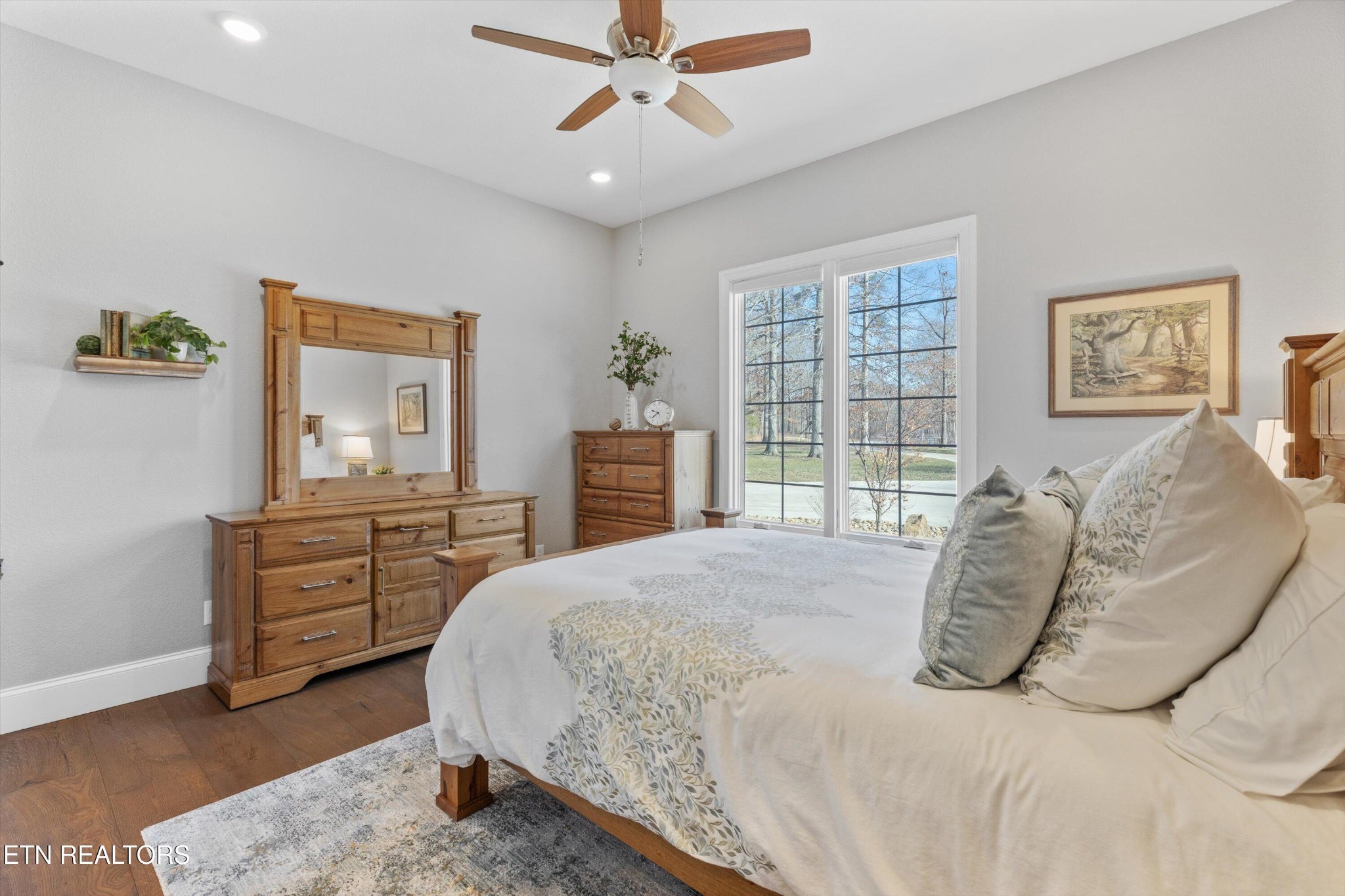 1752 Hillendale Road Crossville, TN 38572 - Photo 27 of 60 a bedroom with a bed and a dresser
