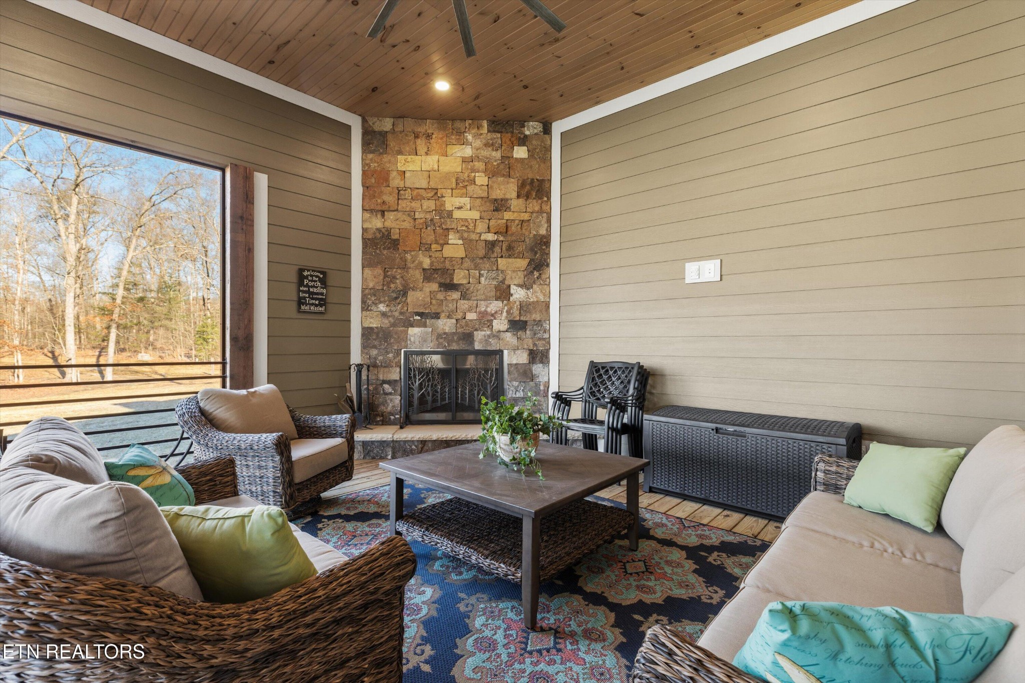1752 Hillendale Road Crossville, TN 38572 - Photo 30 of 60 a outdoor living space with furniture and a potted plant