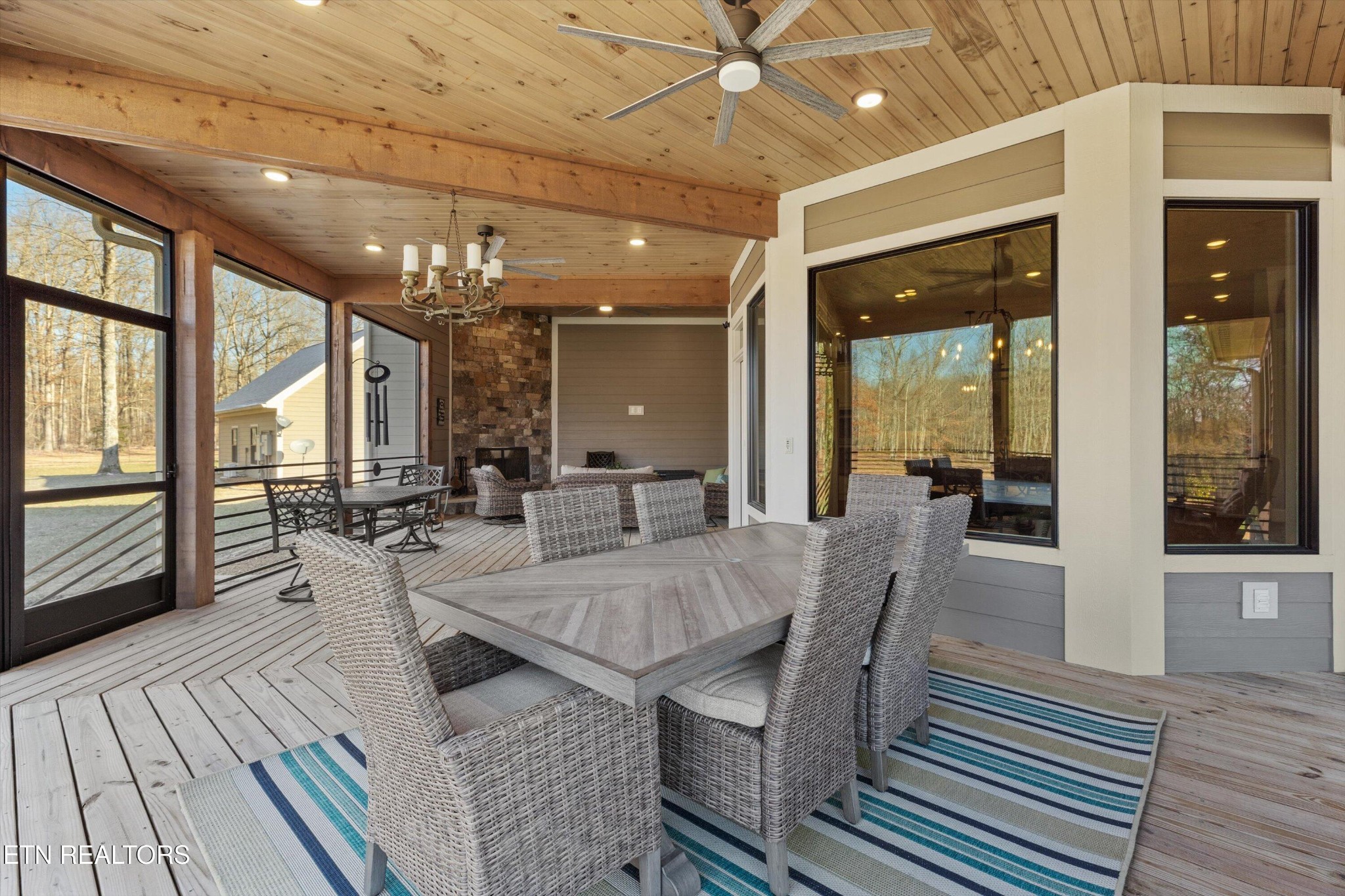 1752 Hillendale Road Crossville, TN 38572 - Photo 32 of 60 a view of a dining room with furniture window and wooden floor