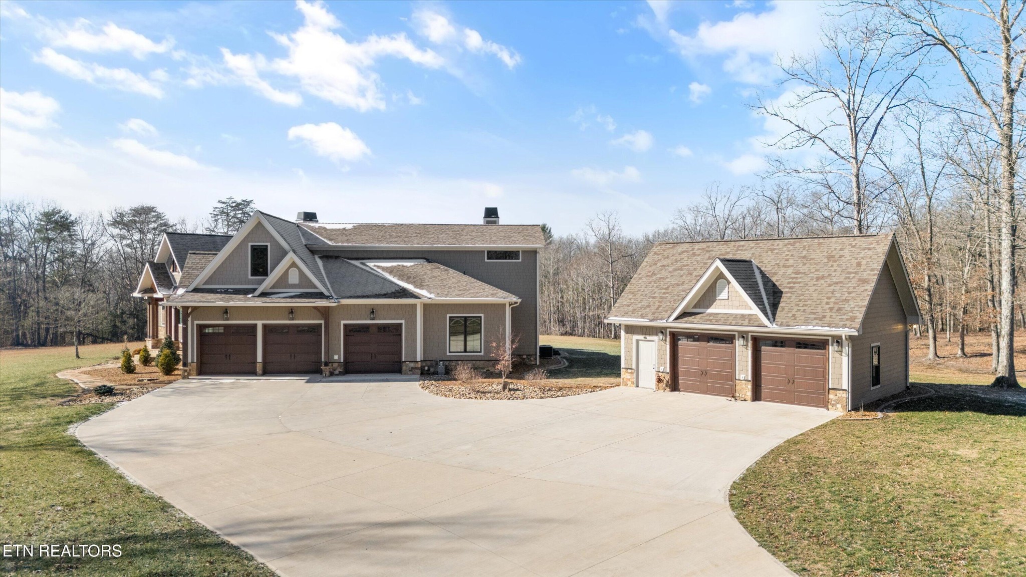 1752 Hillendale Road Crossville, TN 38572 - Photo 38 of 60 a view of a white house with a large windows