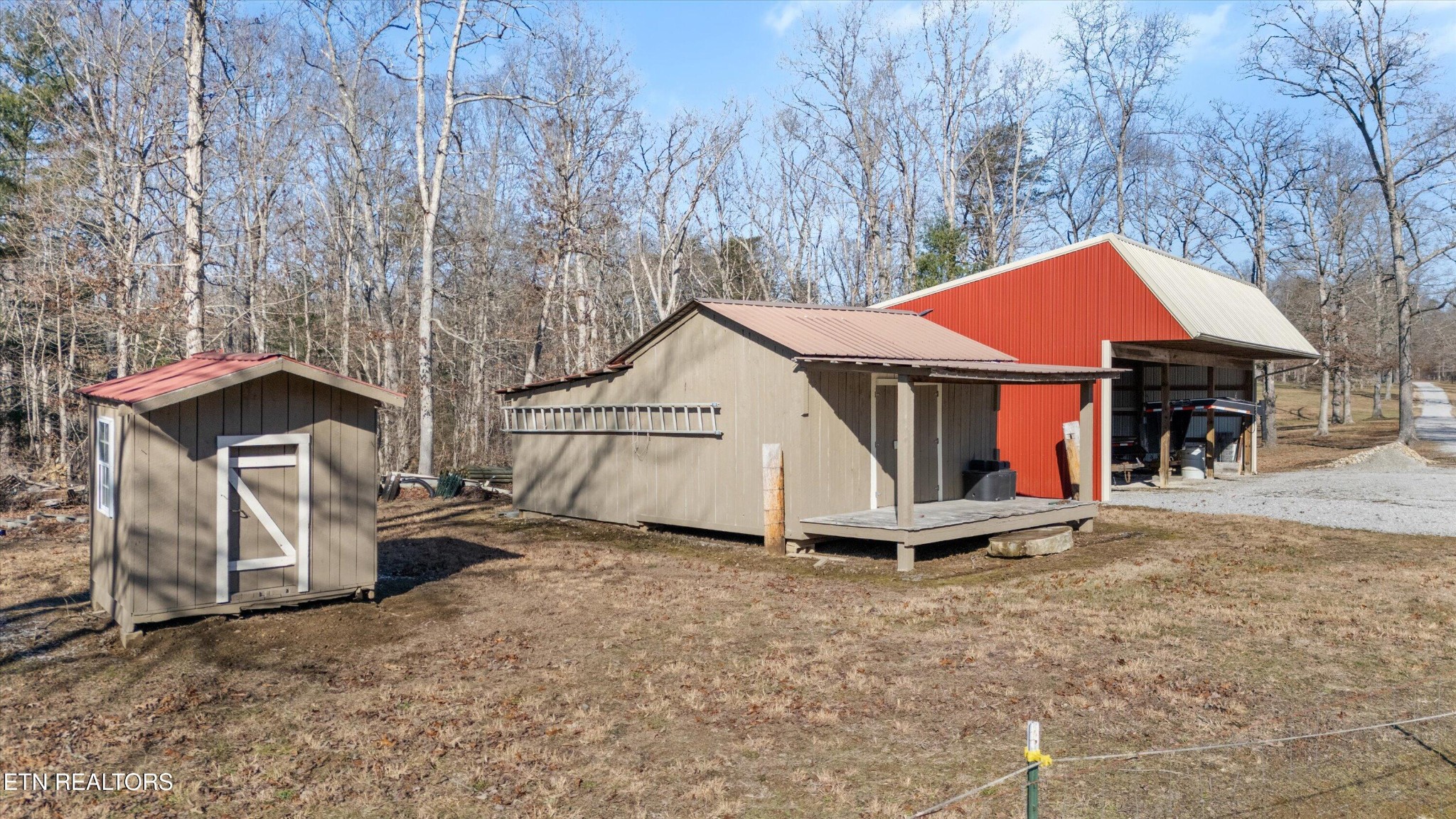 1752 Hillendale Road Crossville, TN 38572 - Photo 44 of 60 a view of a house with a yard and wooden fence