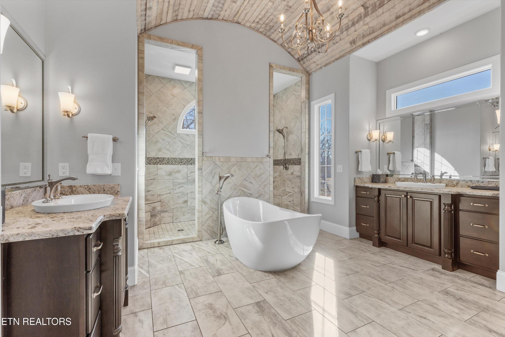 1752 Hillendale Road Crossville, TN 38572 - Photo 7 of 60 a spacious bathroom with a bathtub shower sink and mirror