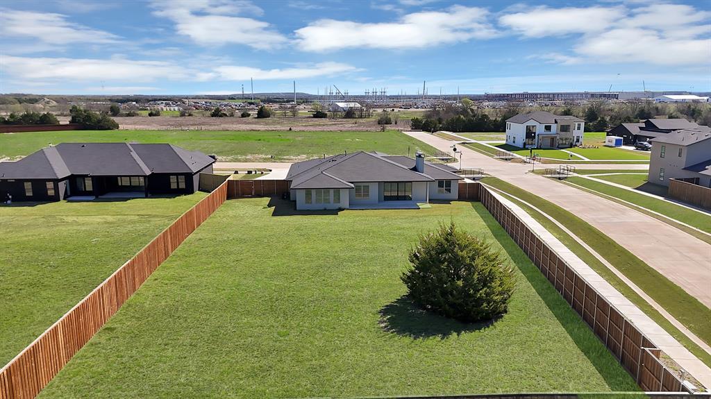 443 Whispering Way Red Oak, TX 75154 - Photo 3 of 36 a view of a lake with houses with outdoor space