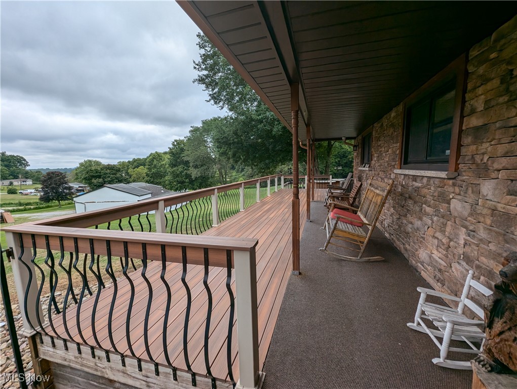 46136 Carlisle Road Lisbon, OH 44432 - Photo 24 of 48 Wooden balcony with a deck