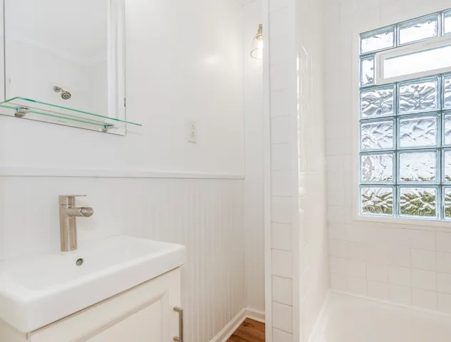 a bathroom with a sink and a bathtub