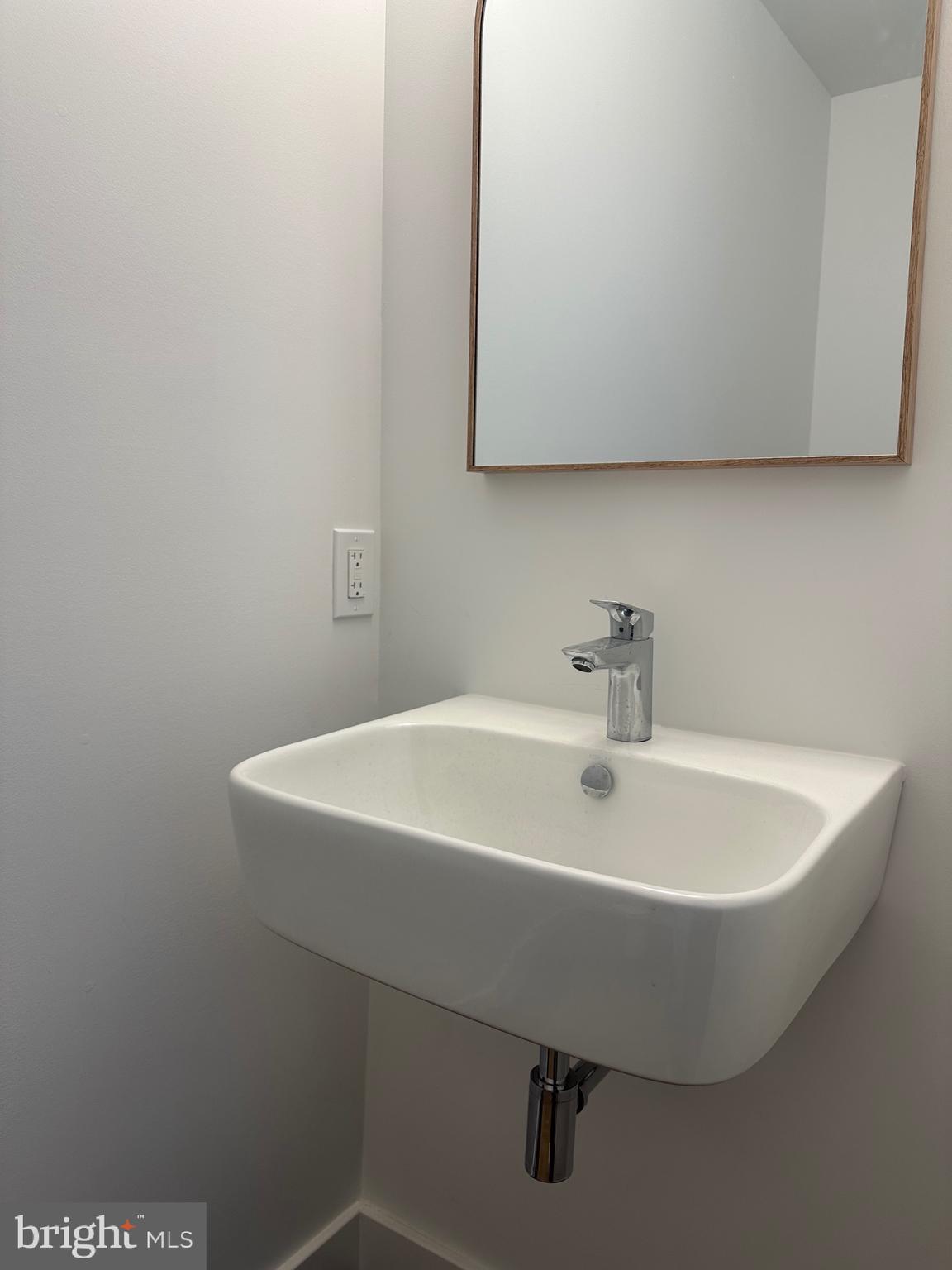 713 Woodfield Road Villanova, PA 19085 - Photo 14 of 33 a white bath tub sitting in a bathroom