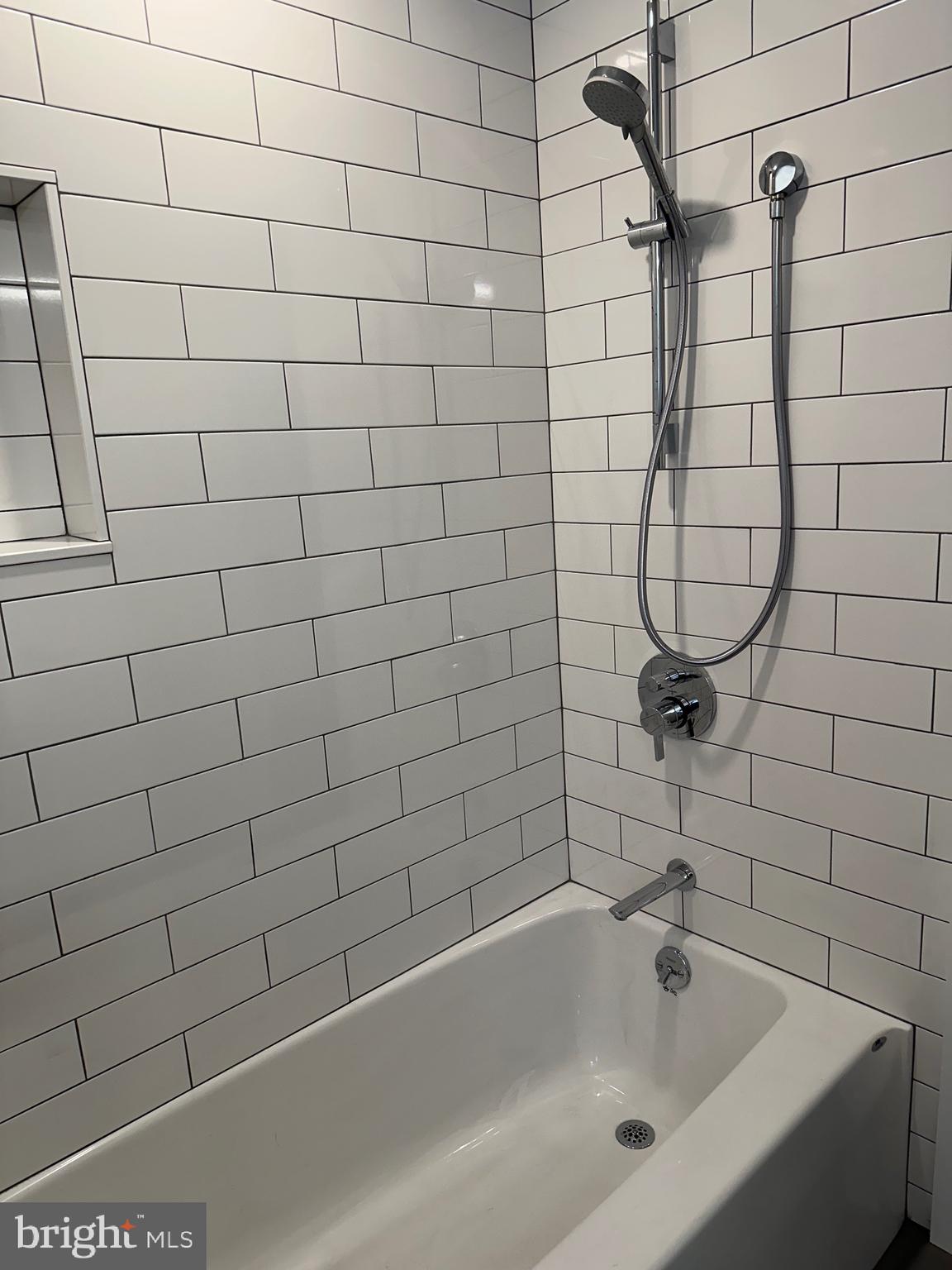 713 Woodfield Road Villanova, PA 19085 - Photo 26 of 33 a bathroom with a bathtub