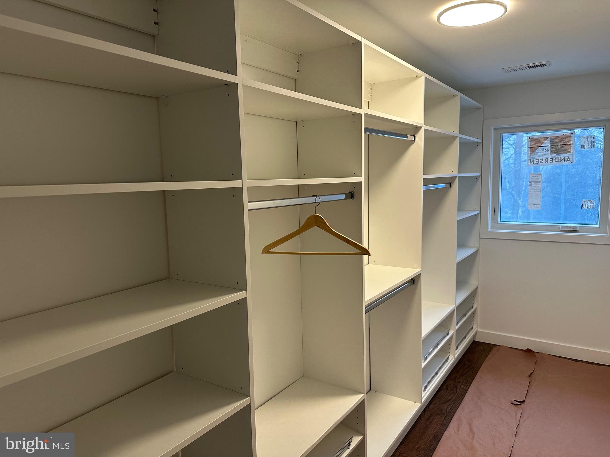 713 Woodfield Road Villanova, PA 19085 - Photo 29 of 33 a view of walk in closet with empty racks