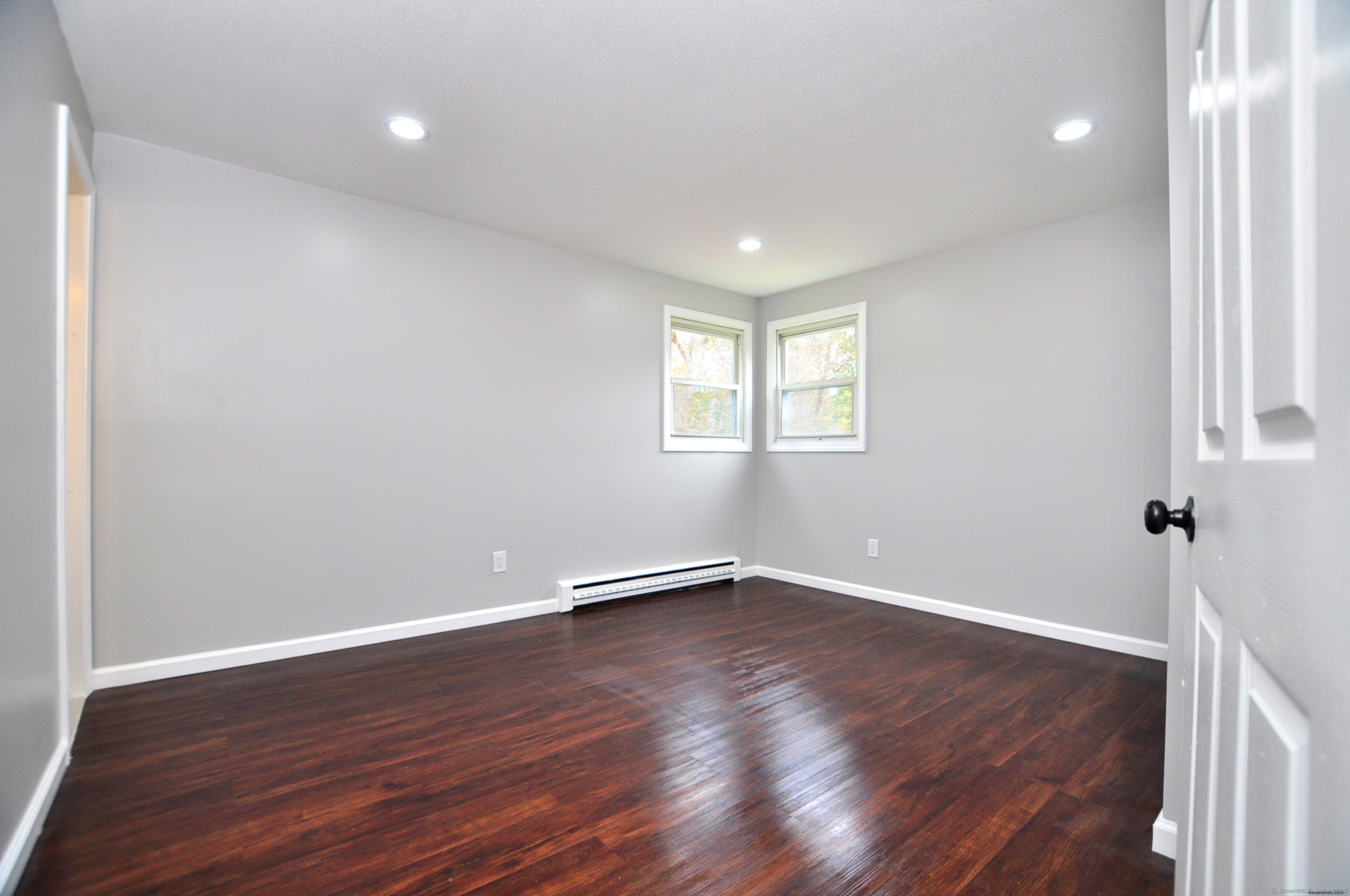 4 Kimann Drive Plymouth, CT 06786 - Photo 15 of 25 wooden floor in an empty room with a window