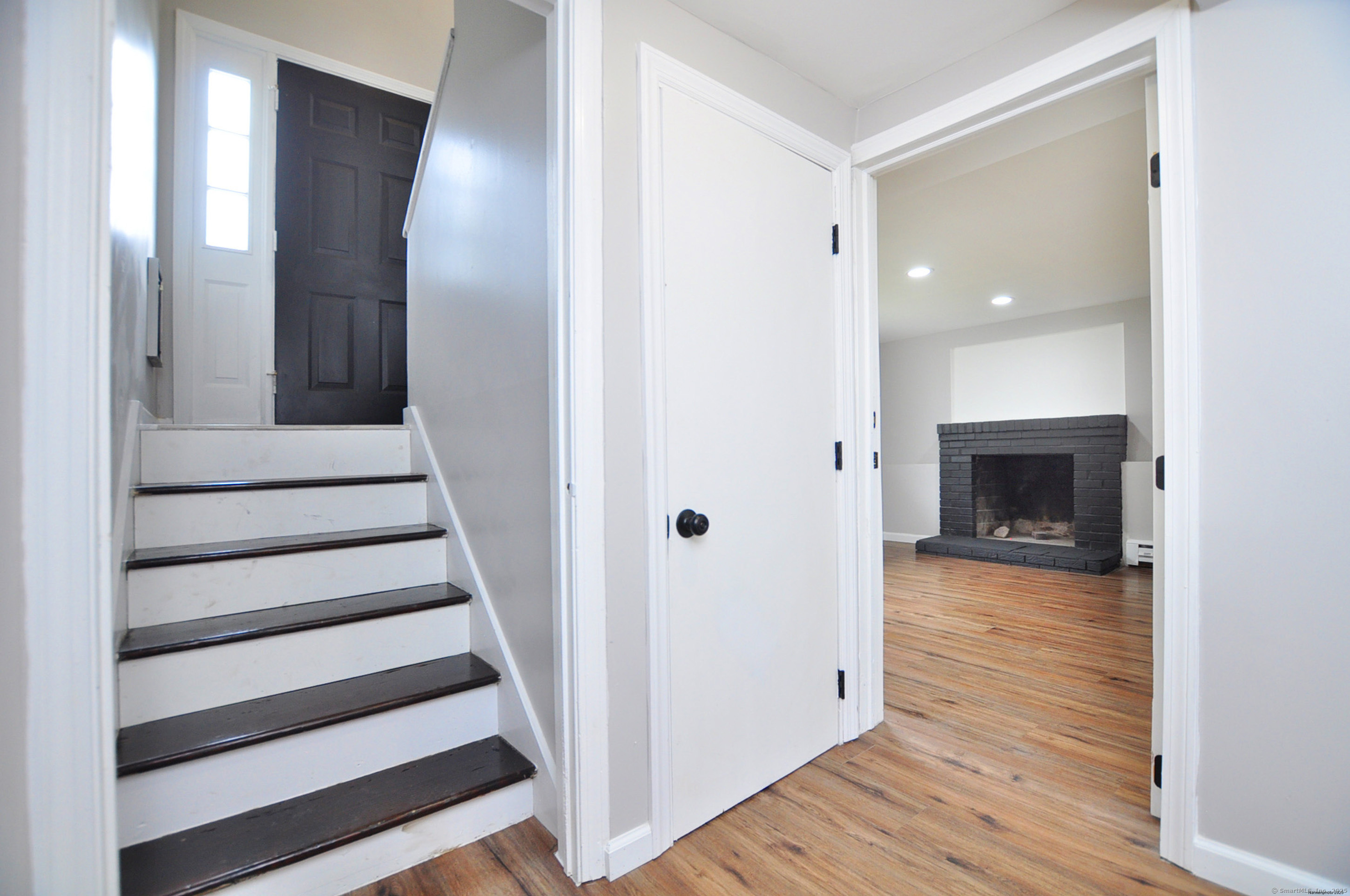 4 Kimann Drive Plymouth, CT 06786 - Photo 18 of 25 a view of a hallway with wooden floor and staircase