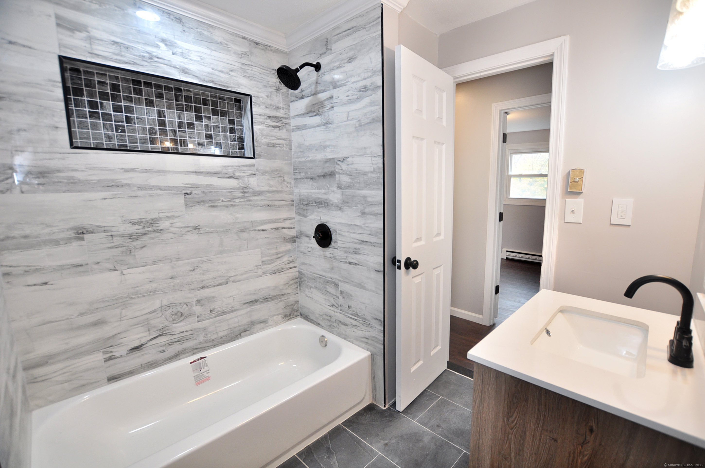 4 Kimann Drive Plymouth, CT 06786 - Photo 10 of 25 a bathroom with a bathtub and shower