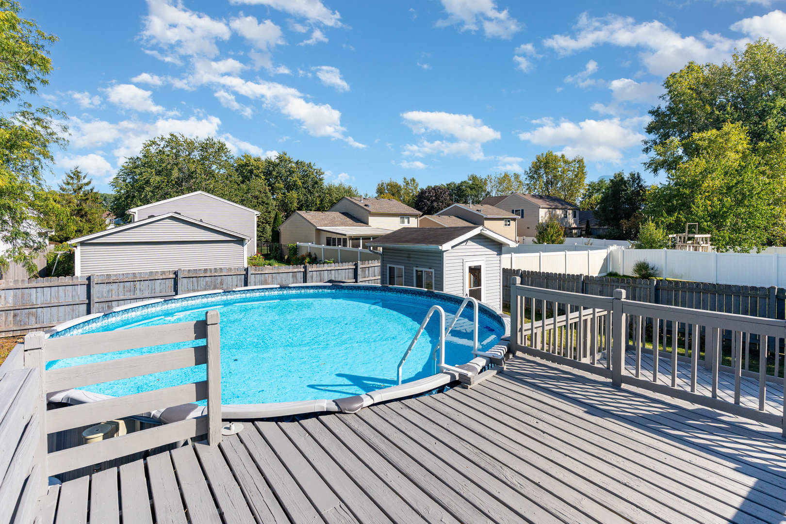 S045 Pleasant Hill Road Wheaton, IL 60187 - Photo 24 of 31 a view of a house with pool and wooden floor