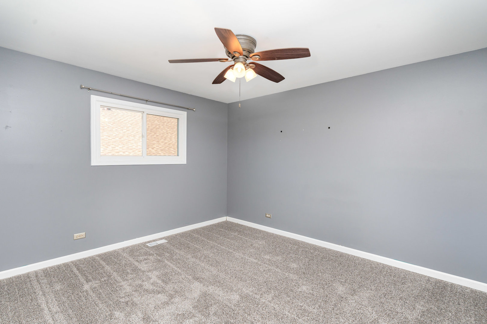 S045 Pleasant Hill Road Wheaton, IL 60187 - Photo 9 of 31 a view of an empty room with a window