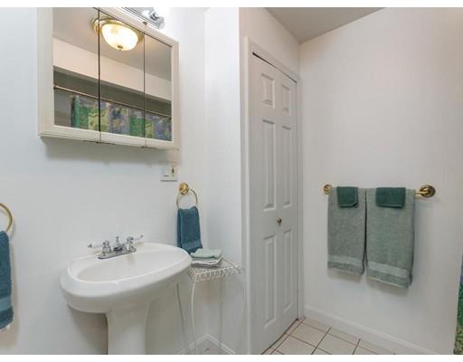 62 Hadley Road Merrimac, MA 01860 - Photo 11 of 23 a bathroom with a sink a toilet and shower