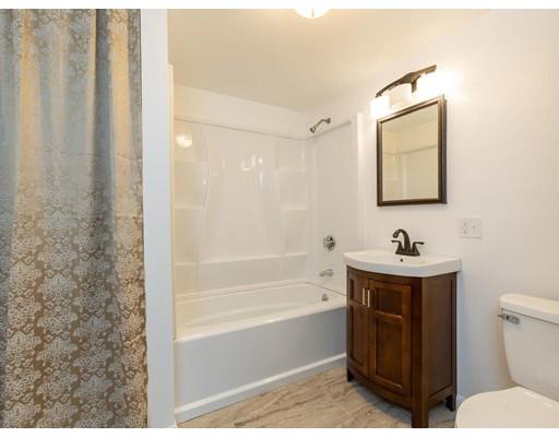 62 Hadley Road Merrimac, MA 01860 - Photo 15 of 23 a bathroom with a toilet a sink and bathtub