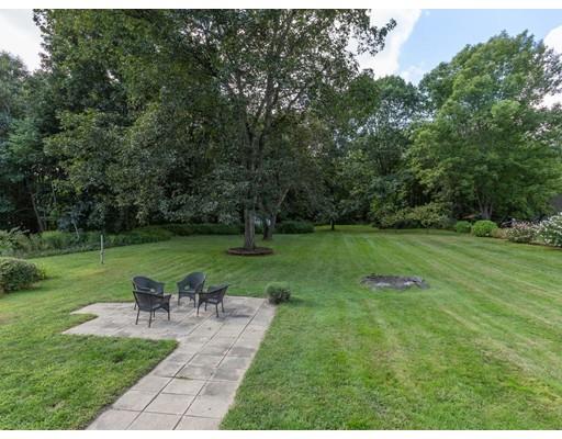 62 Hadley Road Merrimac, MA 01860 - Photo 19 of 23 a view of a garden with lawn chairs