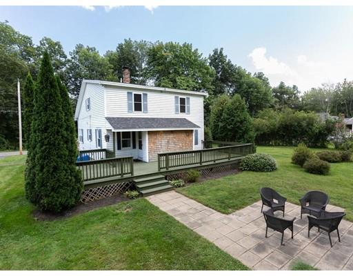 62 Hadley Road Merrimac, MA 01860 - Photo 20 of 23 a front view of house with yard and green space