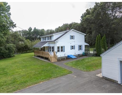 62 Hadley Road Merrimac, MA 01860 - Photo 23 of 23 a front view of a house with a garden and deck