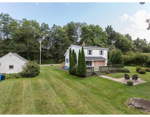 62 Hadley Road Merrimac, MA 01860 - Photo 3 of 23 a view of a house with backyard and a garden