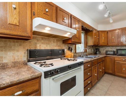 62 Hadley Road Merrimac, MA 01860 - Photo 8 of 23 a kitchen with a stove and a microwave