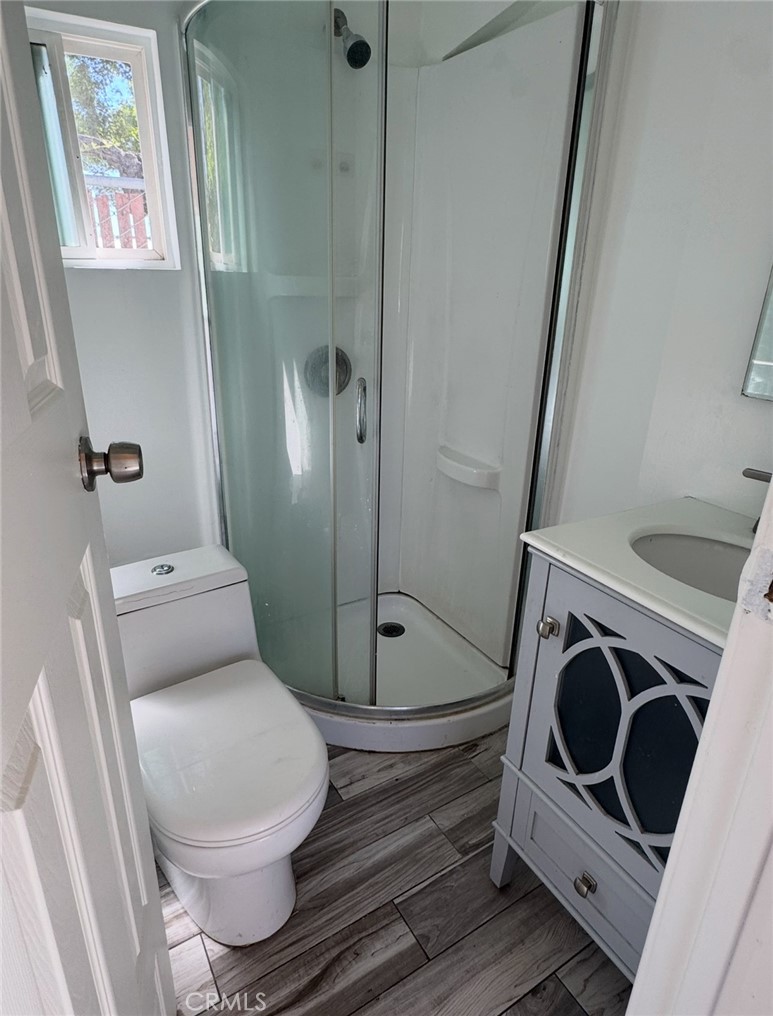 7514 Beckford Avenue Reseda, CA 91335 - Photo 18 of 20 a bathroom with a toilet and a sink