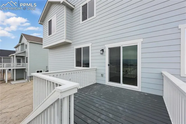 a view of kitchen with wooden floor and window