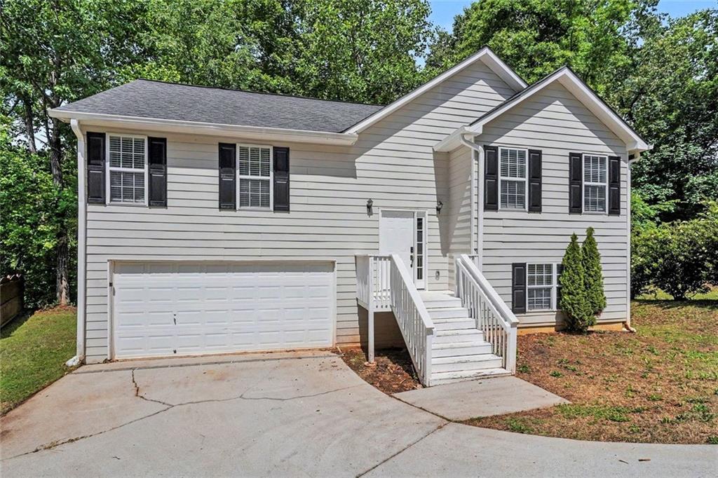 120 Beaverdam Court Covington, GA 30016 - Photo 1 of 20 a view of house that has a window on the house