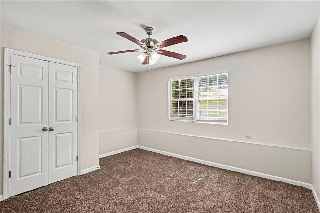 120 Beaverdam Court Covington, GA 30016 - Photo 16 of 20 an empty room with windows and fan
