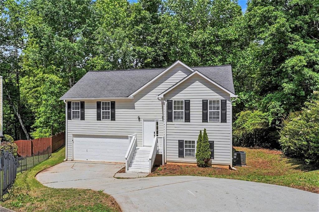 120 Beaverdam Court Covington, GA 30016 - Photo 2 of 20 a view of house with backyard
