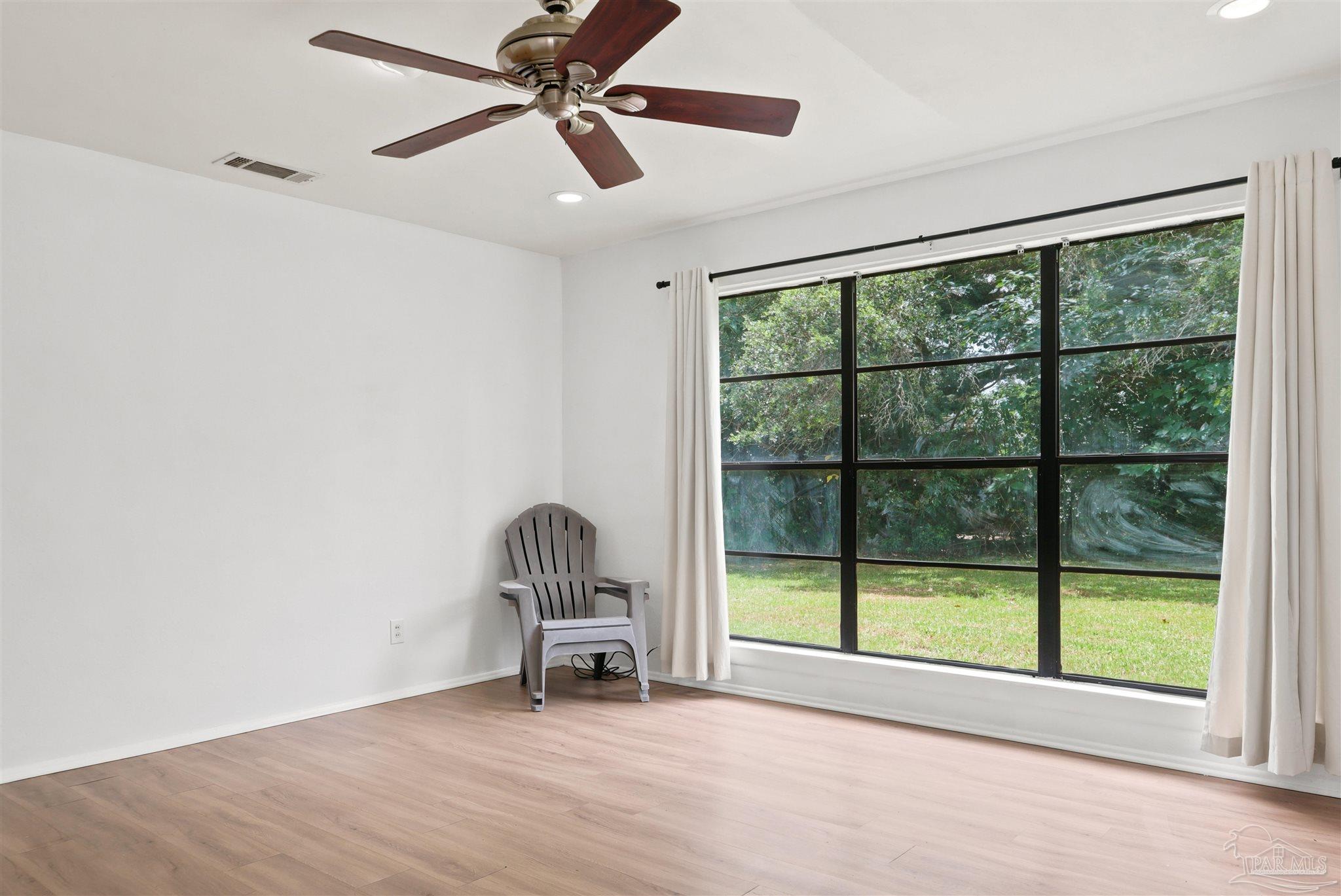 101 Vanderbilt Road Pensacola, FL 32506 - Photo 17 of 33 Living Room, floor-to-ceiling window.