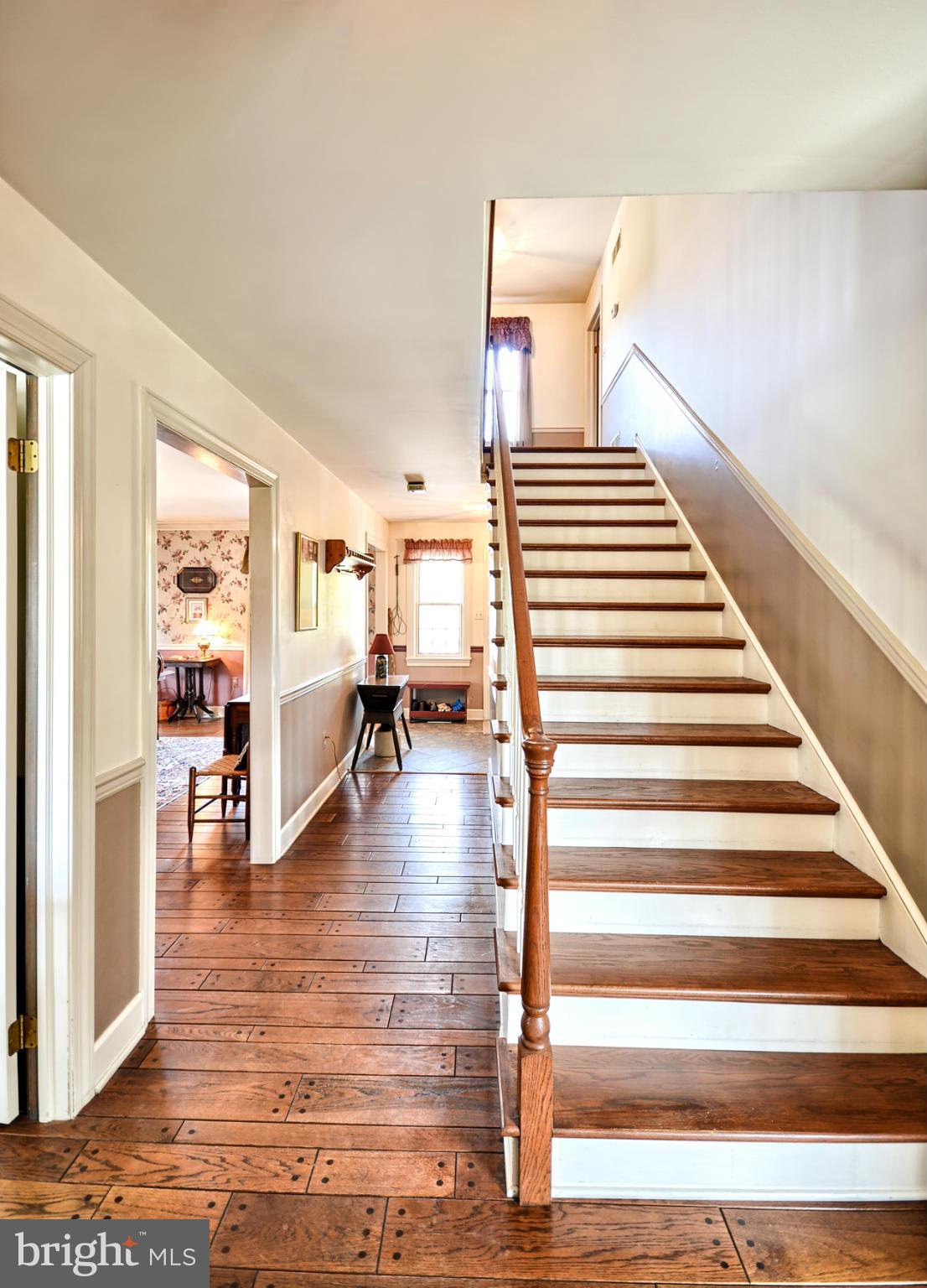 7816 Old Receiver Road Frederick, MD 21702 - Photo 15 of 28 Gracious extra wide staircase to upper level