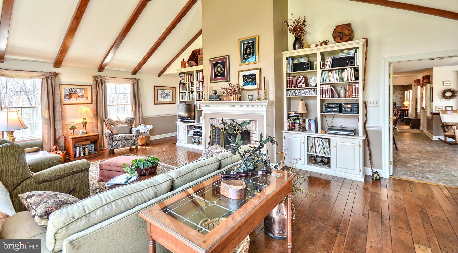 7816 Old Receiver Road Frederick, MD 21702 - Photo 6 of 28 Random width wide plank wood flooring throughout
