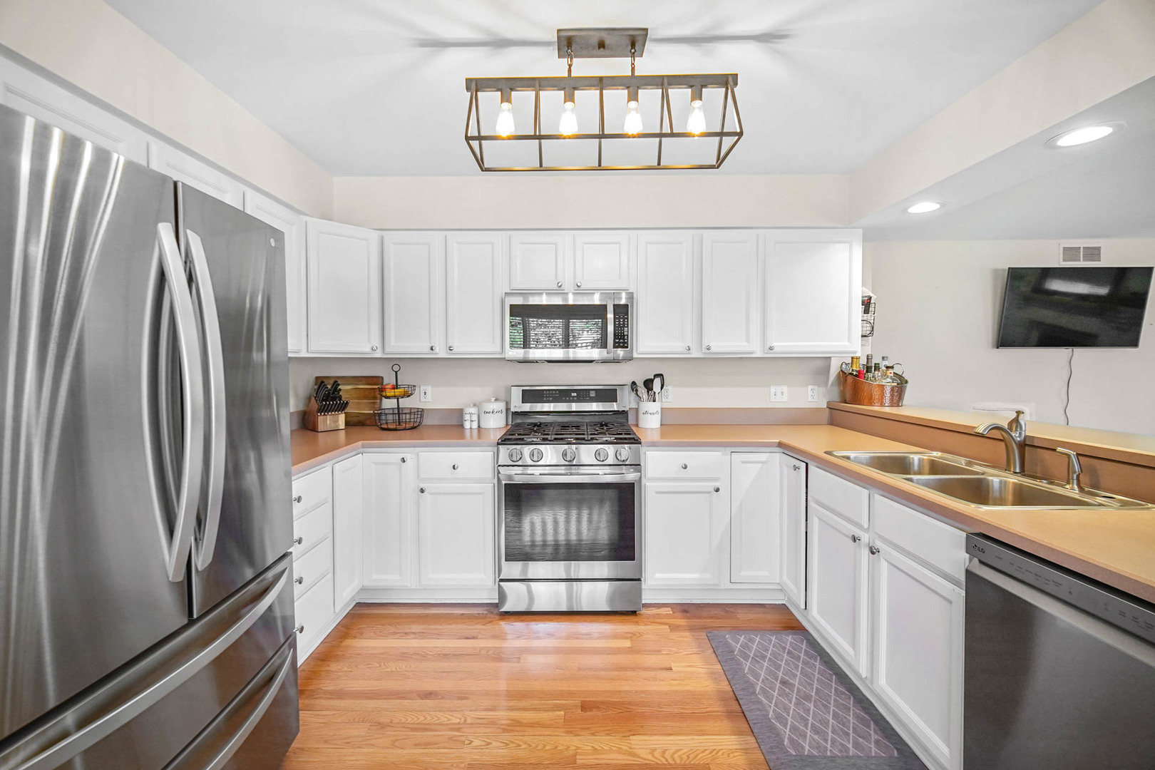 958 Willow Circle DeKalb, IL 60115 - Photo 13 of 35 a kitchen with a sink stove and refrigerator