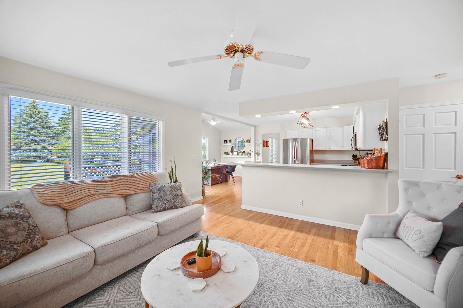 958 Willow Circle DeKalb, IL 60115 - Photo 16 of 35 a living room with furniture and a large window