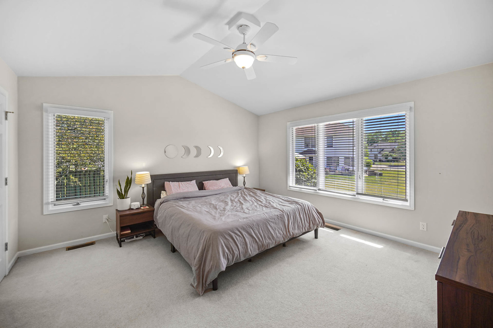 958 Willow Circle DeKalb, IL 60115 - Photo 19 of 35 a bed sitting in a bedroom next to a window