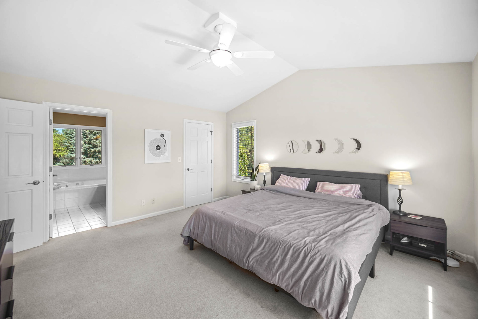 958 Willow Circle DeKalb, IL 60115 - Photo 20 of 35 a bedroom with a bed and a chandelier