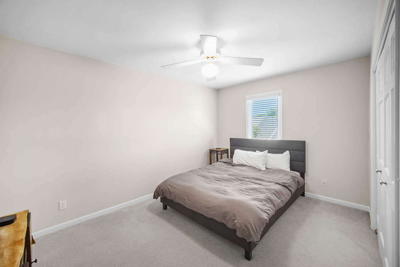 958 Willow Circle DeKalb, IL 60115 - Photo 26 of 35 a bedroom with a bed and a ceiling fan
