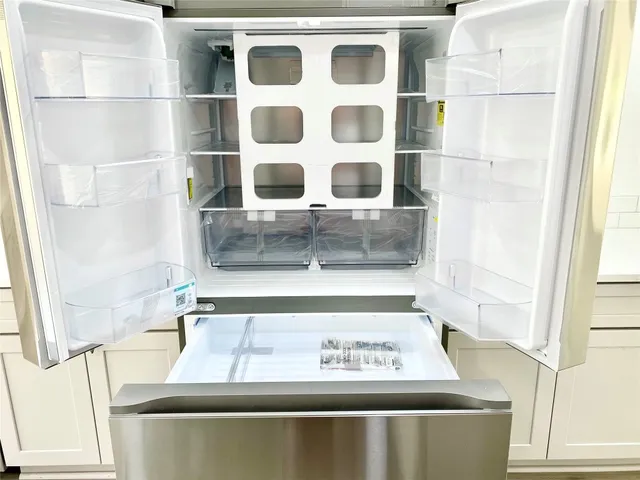 a view of a bathroom with sink and window
