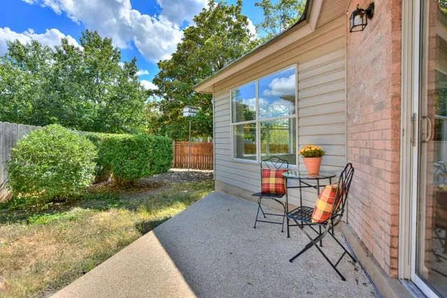 a backyard of a house with lots of green space