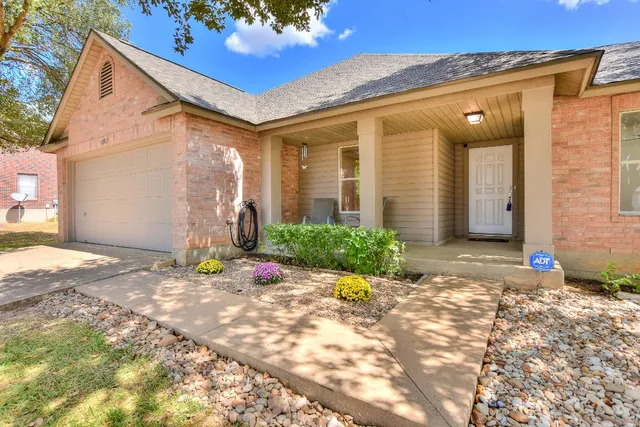 a front view of a house with a patio