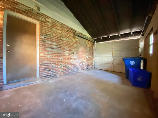 a view of empty room with windows