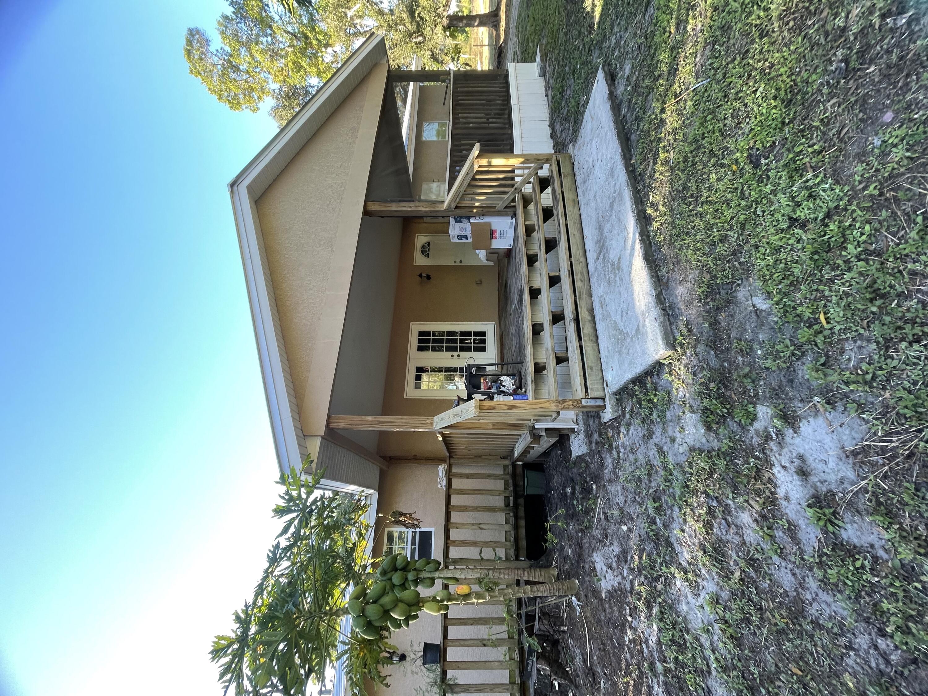 1220 A Road LaBelle, FL 33935 - Photo 10 of 42 a view of a small yard with table and chairs