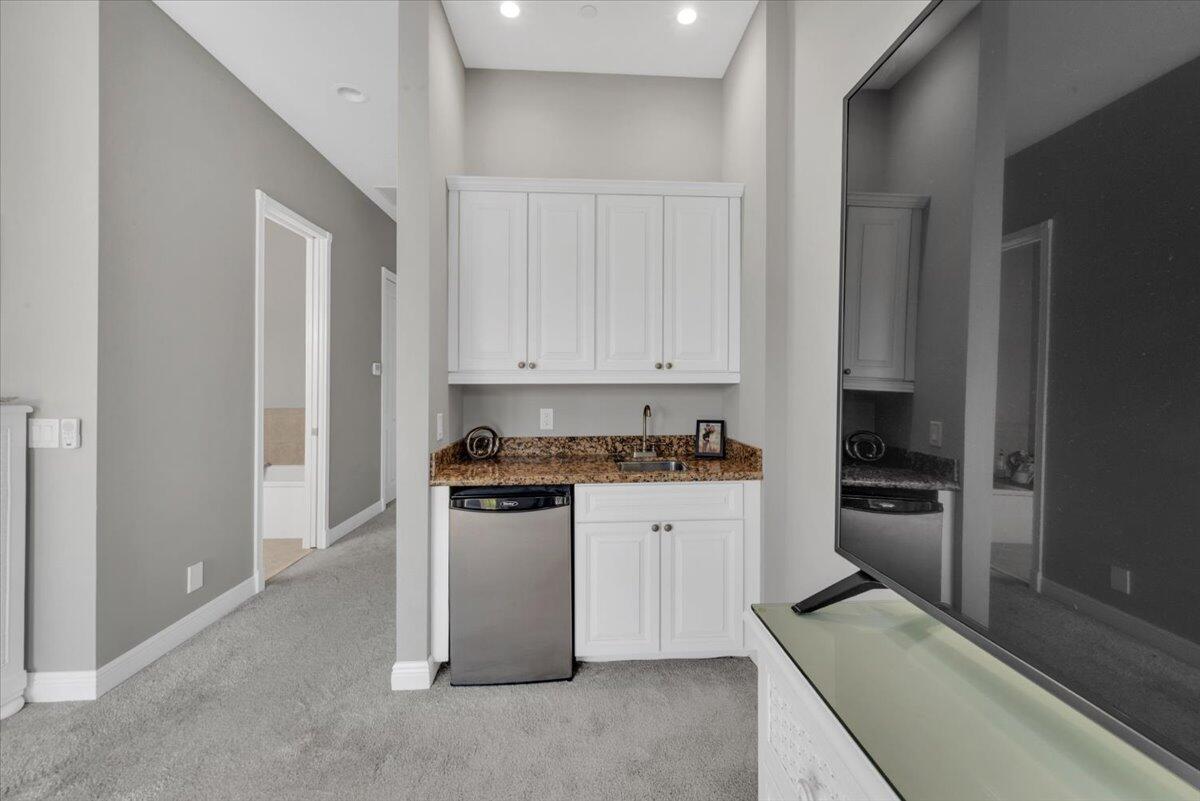 502 Del Sol Circle Tequesta, FL 33469 - Photo 56 of 73 Top floor master bedroom wet bar/fridge