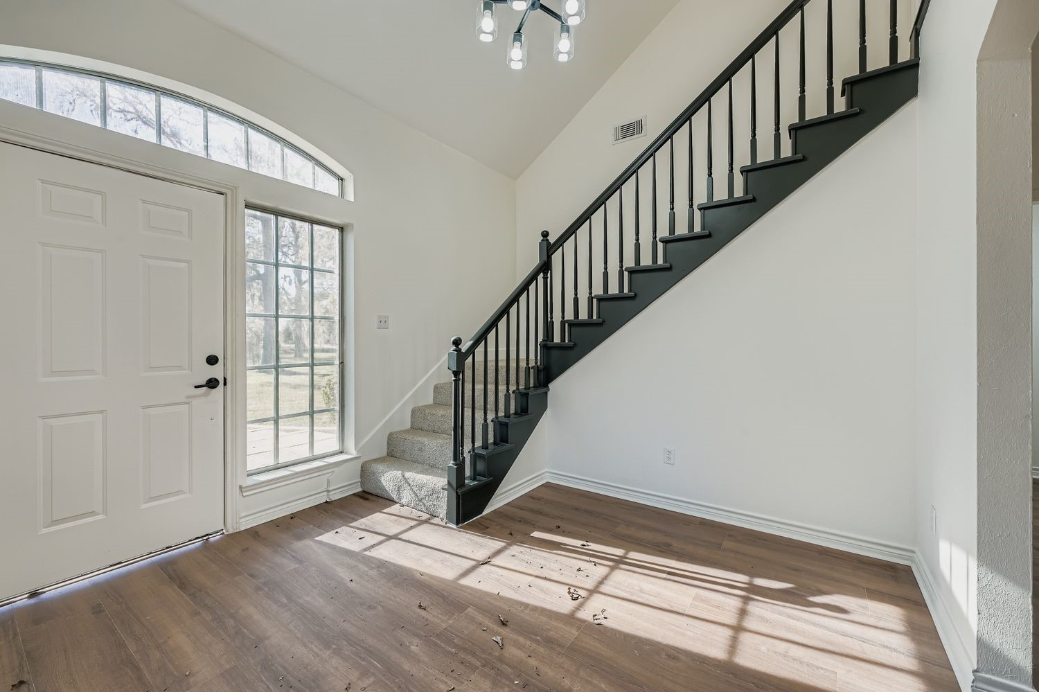 34411 Fulshear Farms Road Fulshear, TX 77441 - Photo 5 of 29 a view of an entryway with wooden floor