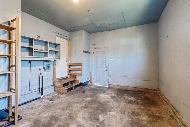 a view of a room with shelves