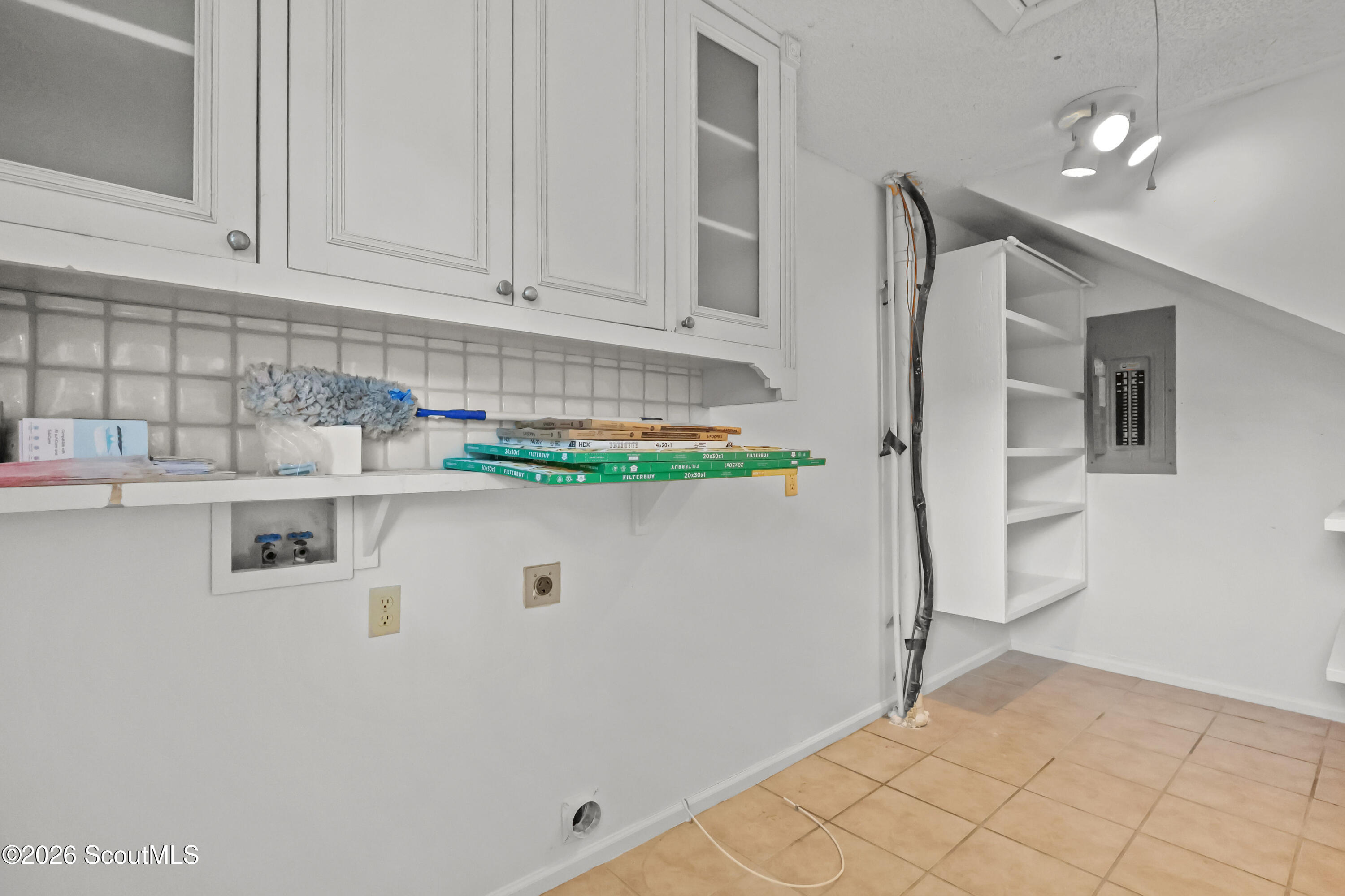104 Sapelo Street St. Simons Island, GA 31522 - Photo 22 of 45 Utility Room with washer dryer hook up and panty space